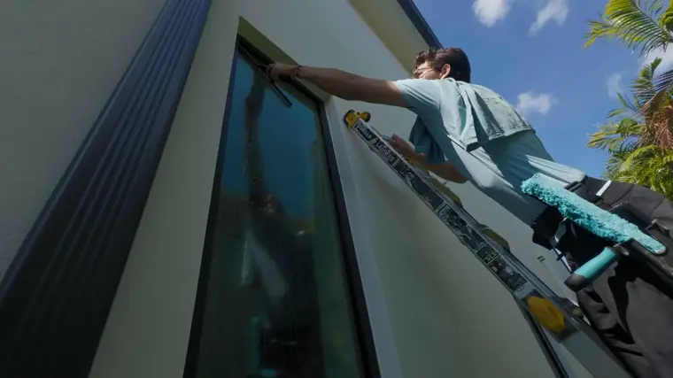Crystal Bear technician cleaning exterior windows